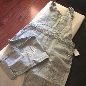 Striped ripped denim overalls
